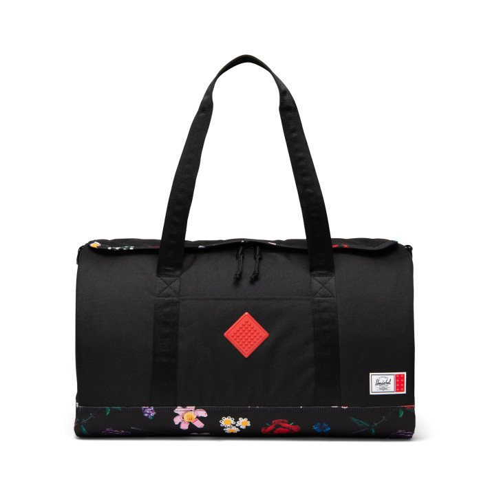 Herschel Heritage™ weekendtas – zwart met dwarrelende bloemen